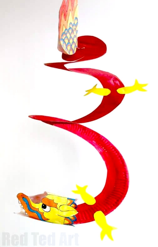 Dragon Puppet Printable. Super easy and fun Paper Dragon Puppets for Chinese New Year! A great Paper Chinese New Year craft for preschoolers. Love these gorgeous paper dragon puppets. #dragon #dragoncrafts #kids #preschool #chinesenewyear