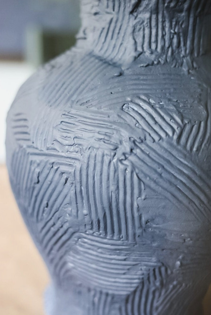 closeup image of a blue vase