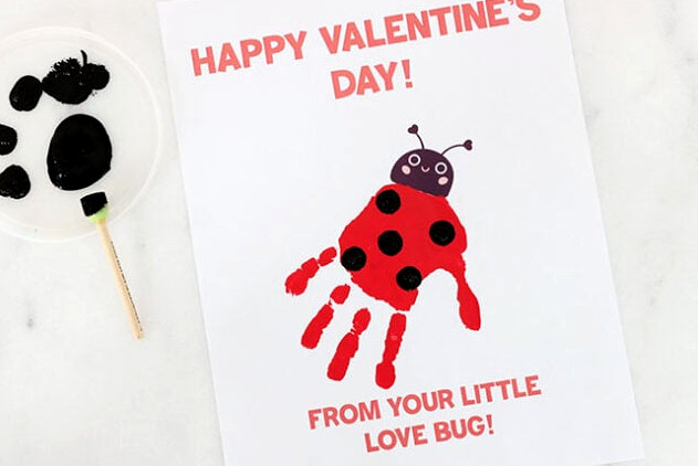 Adding spots to a ladybug handprint