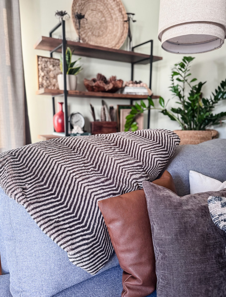 living room with zebra blanket