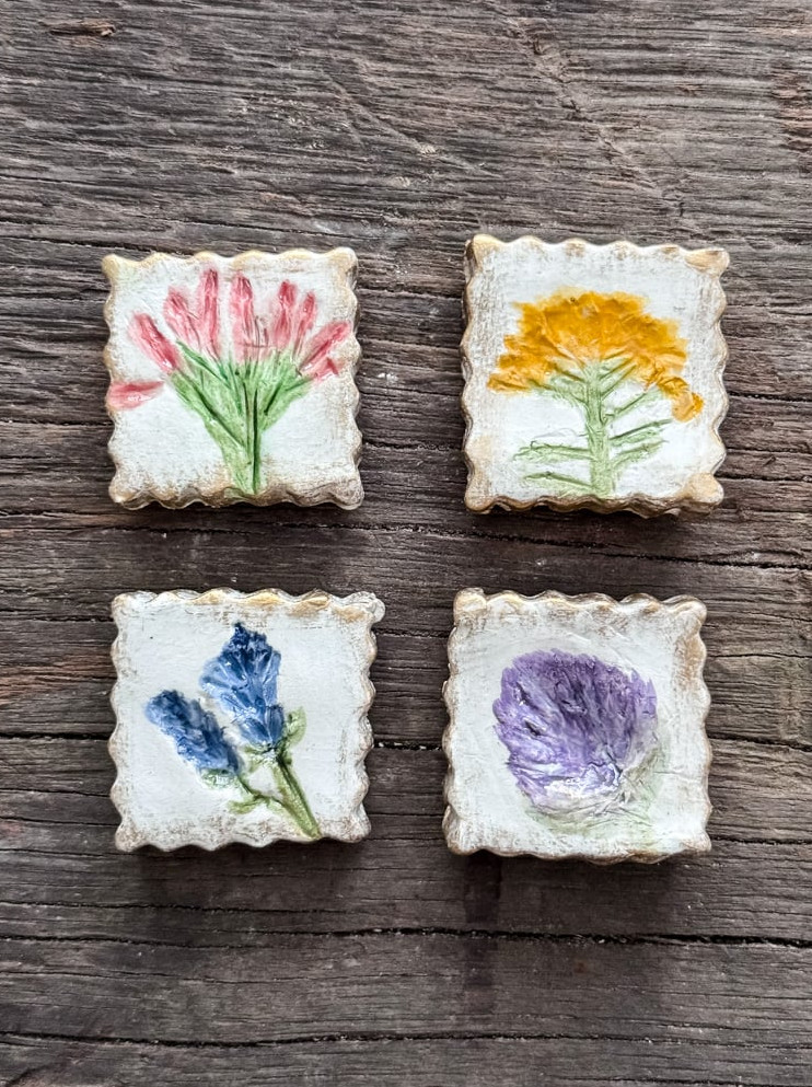 4 clay magnets with flowers painted