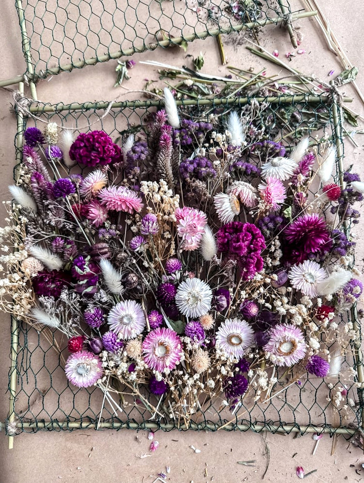 frame covered with dried flowers