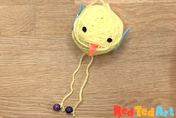 adorable finished yarn bird ornament