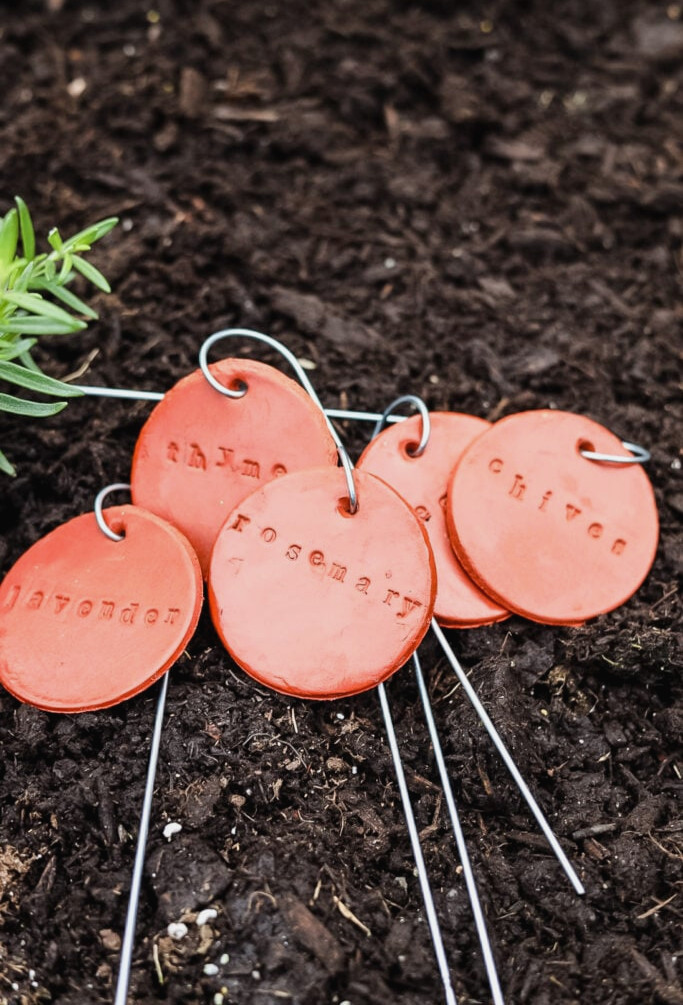clay plant markers with herb names