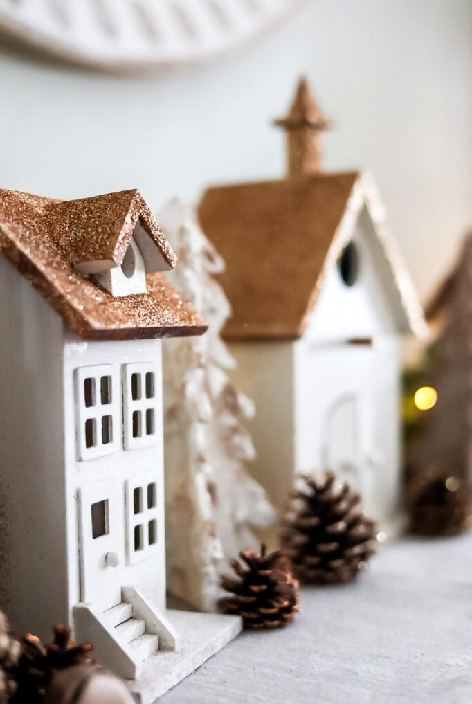a gold and white Christmas village