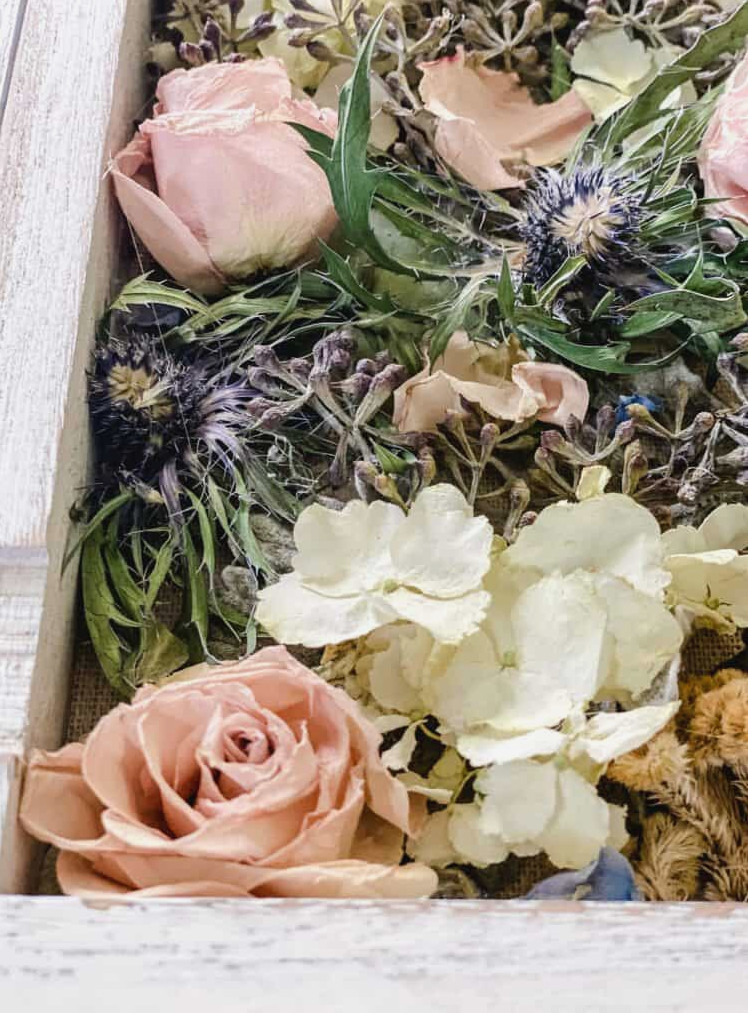 making a shadowbox with flowers