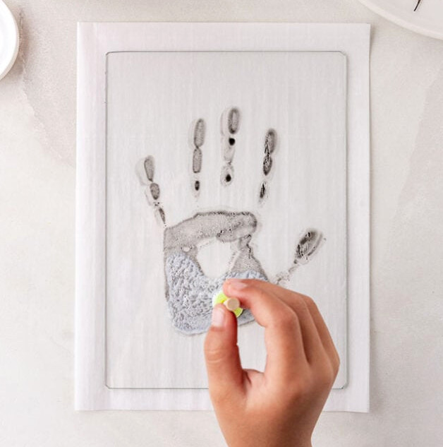 Add mod podge to handprint