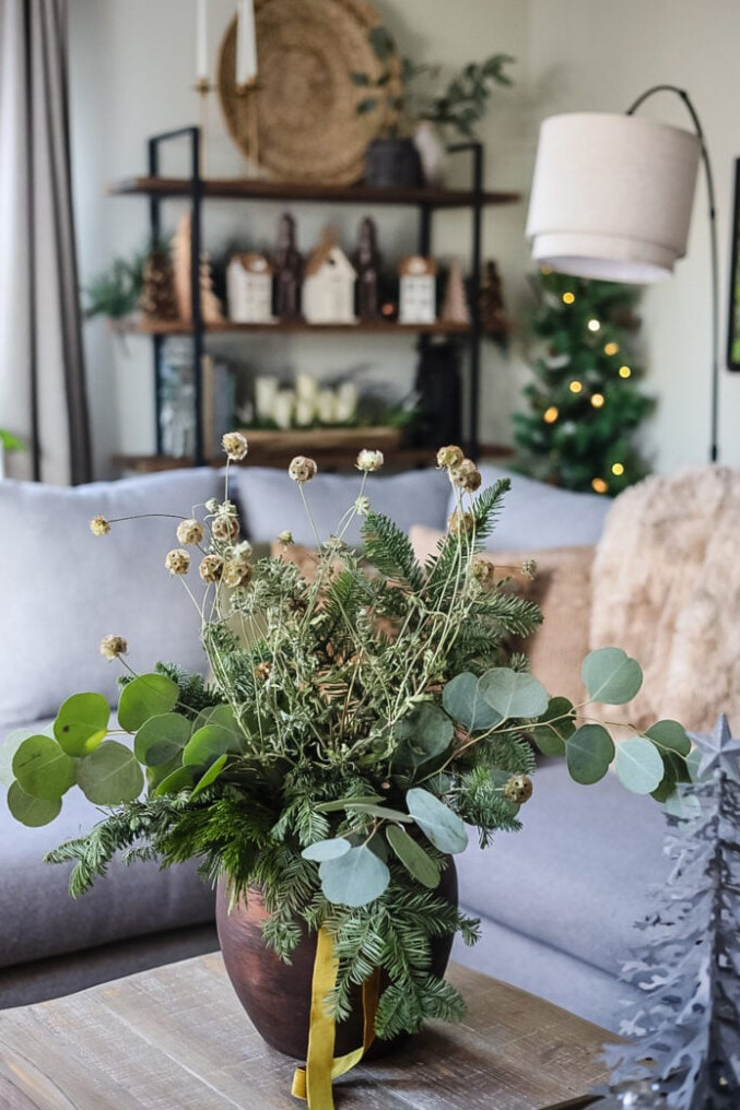 a large winter planter on a coffee table