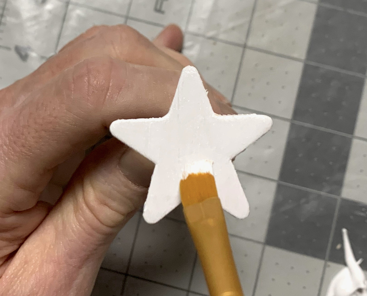 Painting wood stars with white paint