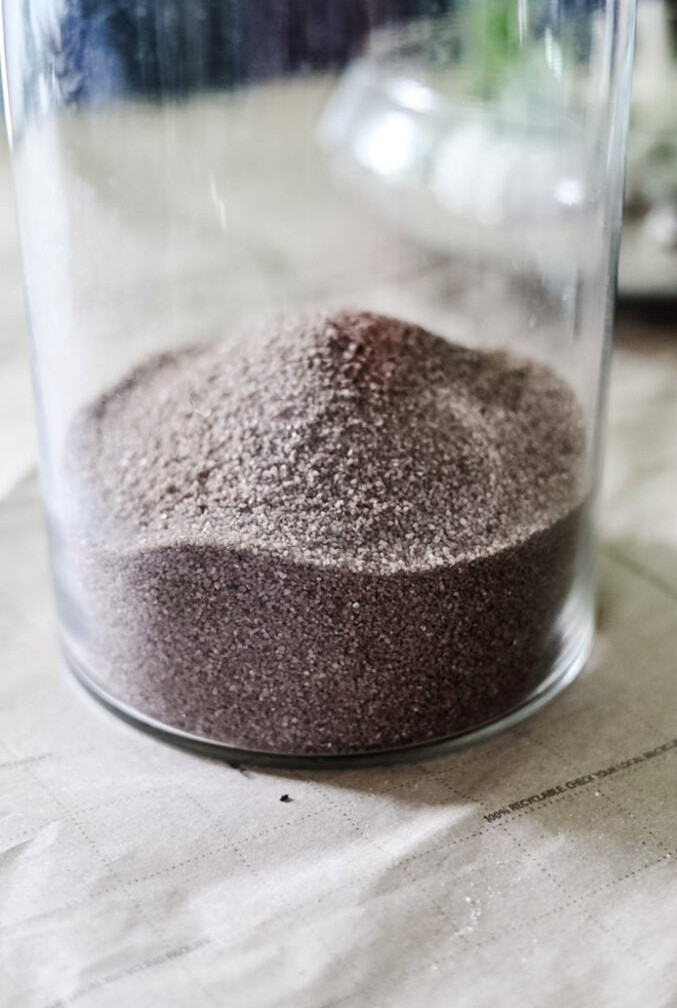 sand in glass vase