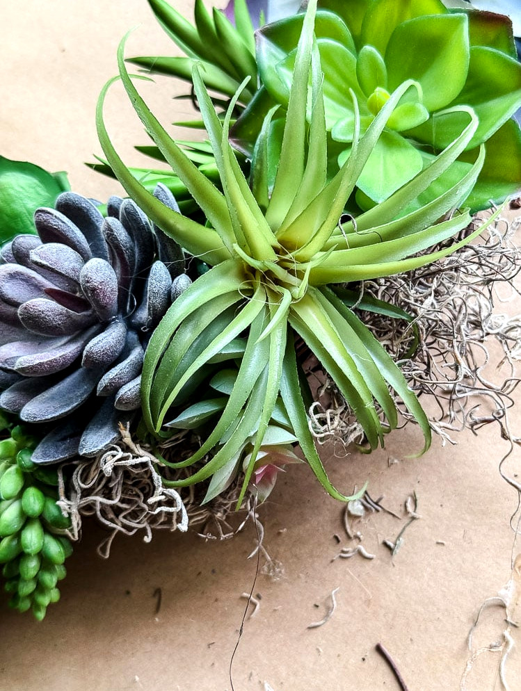 closeup view of a faux succulent wreath